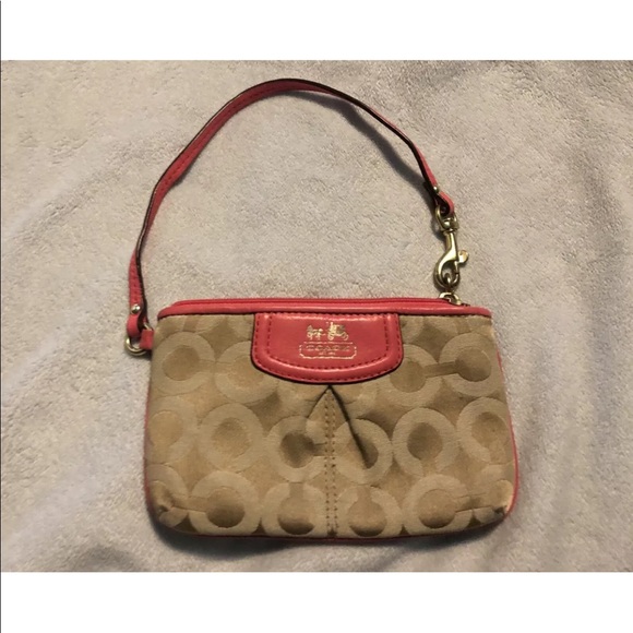 Coach Accessories - Coach wristlet tan and pink.